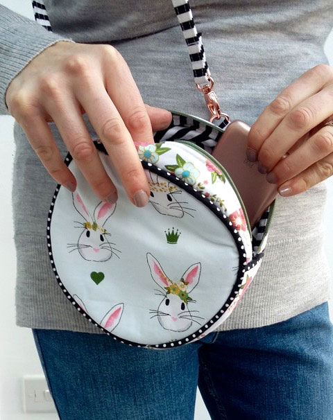The Alice Bag, a round bag sewing pattern, shown sewn by SewSofia - featuring Wonderland Fabric