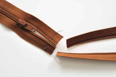 Cut and sewn brown zipper