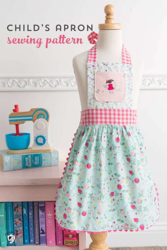 child's apron on dress form