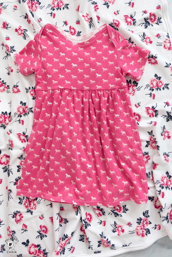 baby dress and floral baby blanket