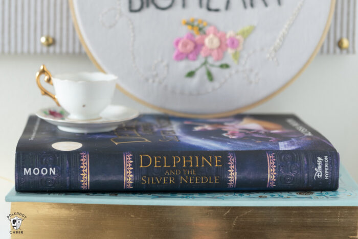 close up of book spine "delphine and the silver needle"