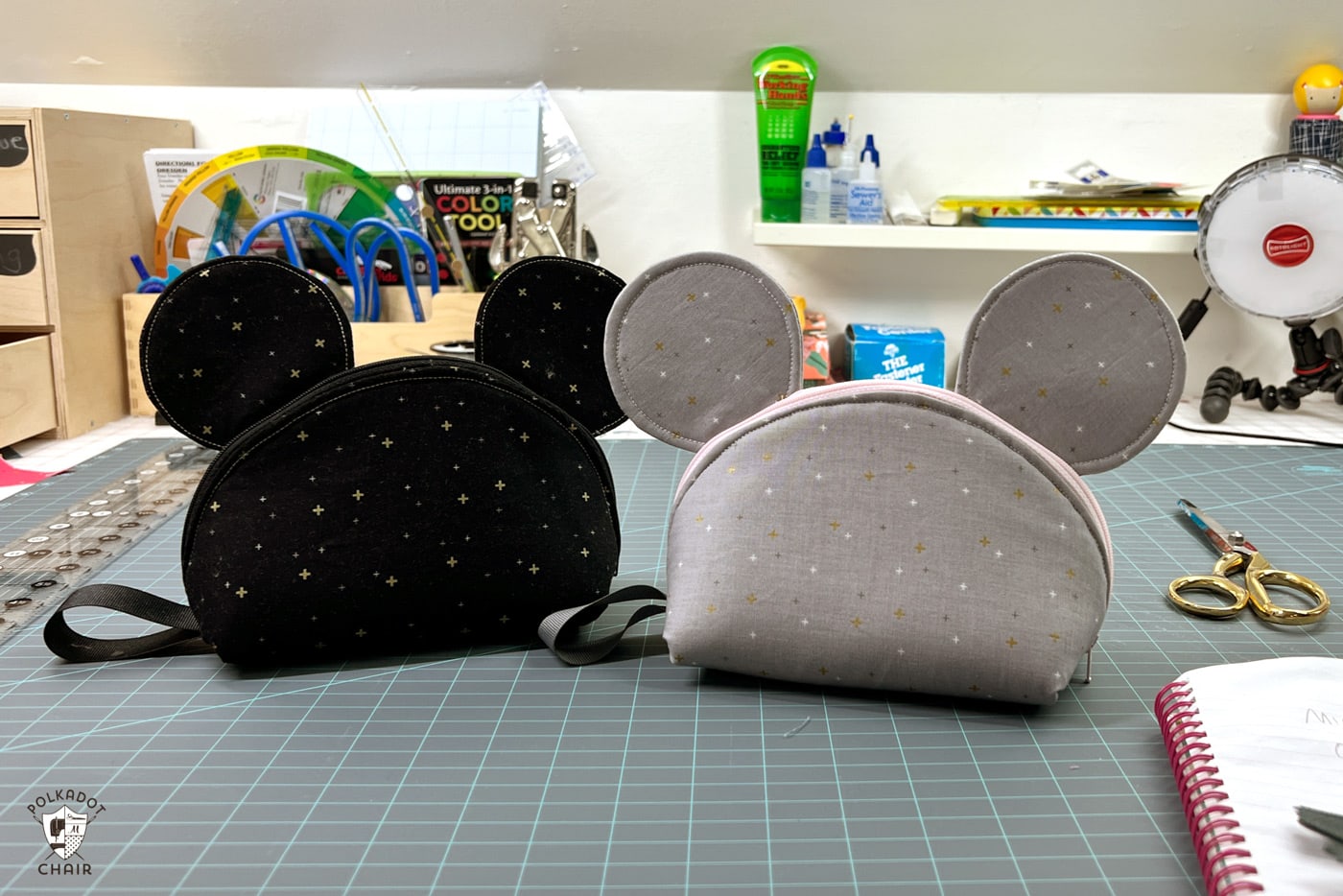 black and gray mouse bags on sewing table