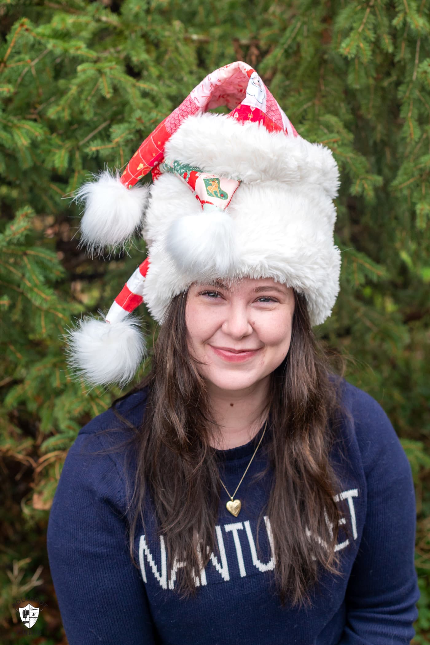 woman wearing santa claus hats