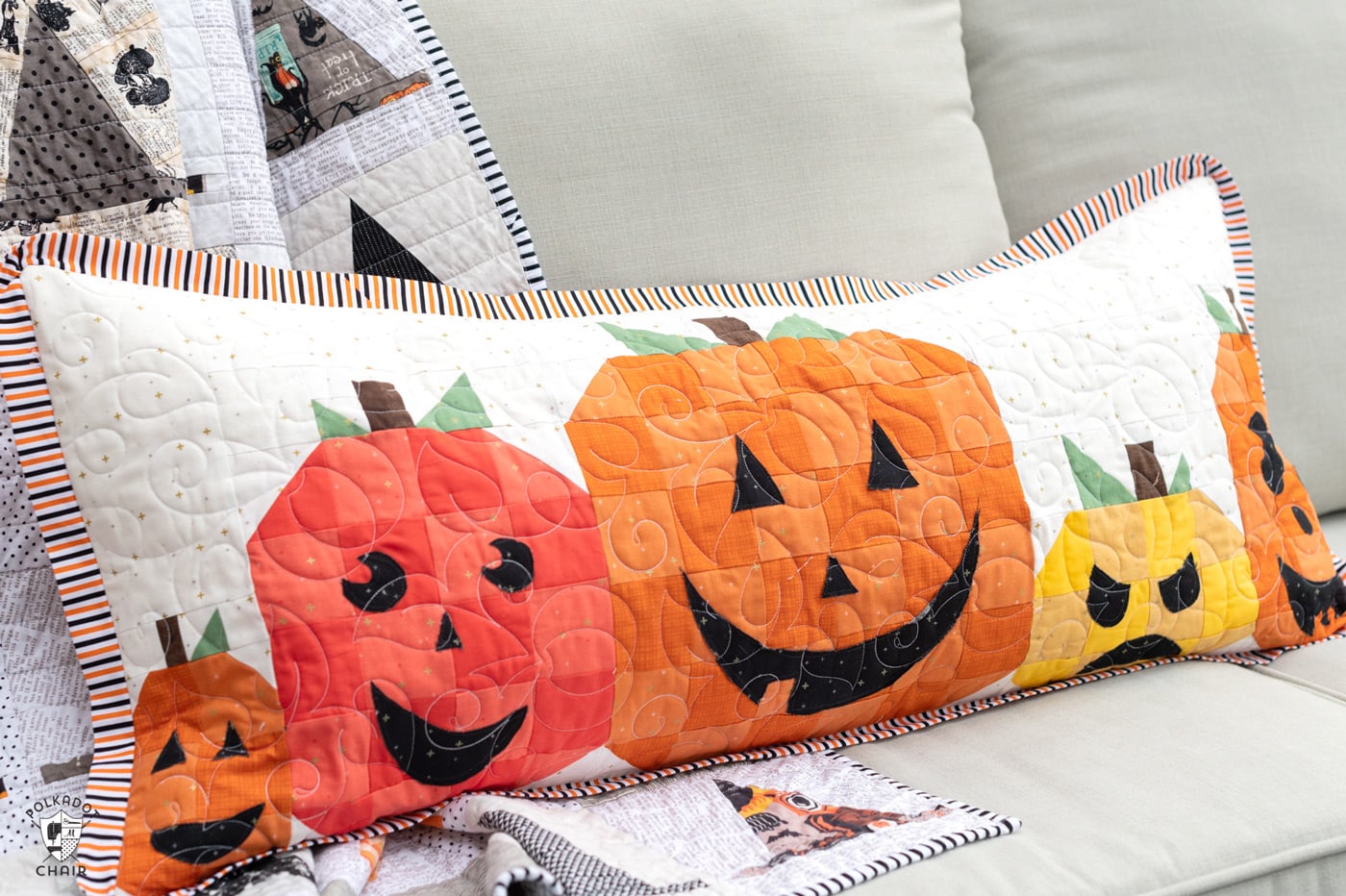 pumpkin pillow on couch outdoors