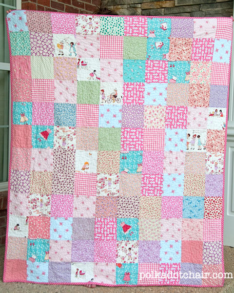 pink and blue patchwork quilt